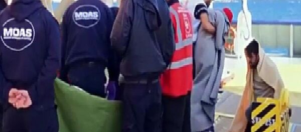 İnsan tacirine ölümüne yol açtığı çocuklar gösterildi. İnsan tacirine ölümüne yol açtığı çocuklar gösterildi. - Sputnik Türkiye