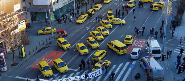 Budapeşte'de taksiciler 'Uber' uygulamasını protesto etti Budapeşte'de taksiciler 'Uber' uygulamasını protesto etti - Sputnik Türkiye