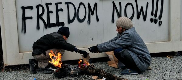 Yunanistan'ın sınır köyü İdomeni'de Makedonya'ya geçmek için bekleyen sığınmacılar - Sputnik Türkiye