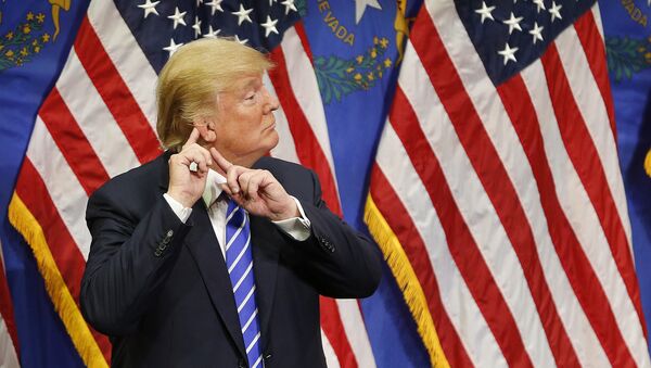 Republican presidential candidate Donald Trump reacts after speaking at a rally. - Sputnik Türkiye