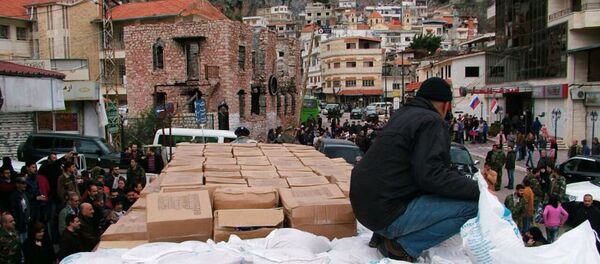 Rusya'dan Suriye'de Türkmenlerin yaşadığı Burj İslam kasabasına insani yardım - Sputnik Türkiye