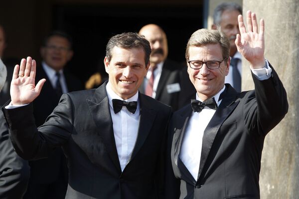 Almanya'nın eşcinsel olduğunu açıklayan ilk dışişleri bakanı  Westerwelle ve partneri Michael Mronz. - Sputnik Türkiye