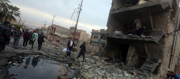 Bağdat'ta meydana gelen bir intihar saldırısı (12 Ocak 2016) - Sputnik Türkiye