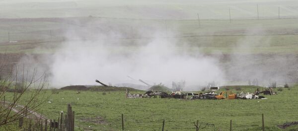 An Armenian artillery unit is seen in the town of Martakert, where clashes with Azeri forces are taking place, in Nagorno-Karabakh region, which is controlled by separatist Armenians, April 3, 2016. An Armenian artillery unit is seen in the town of Martakert, where clashes with Azeri forces are taking place, in Nagorno-Karabakh region, which is controlled by separatist Armenians, April 3, 2016. - Sputnik Türkiye
