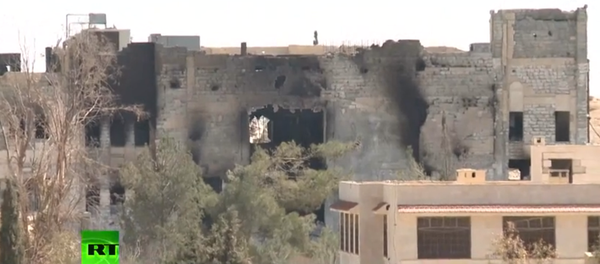 RT ekibi, Karyatayn’daki IŞİD yıkımını görüntüledi RT ekibi, Karyatayn’daki IŞİD yıkımını görüntüledi - Sputnik Türkiye