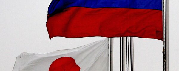 Japonya-Rusya bayrağı Japonya-Rusya bayrağı - Sputnik Türkiye