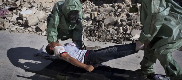 Halep'te düzenlenen bir kimyasal saldırı tatbikatı. - Sputnik Türkiye