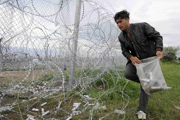 İdomeni kasabasındaki sığınmacılar  - Sputnik Türkiye