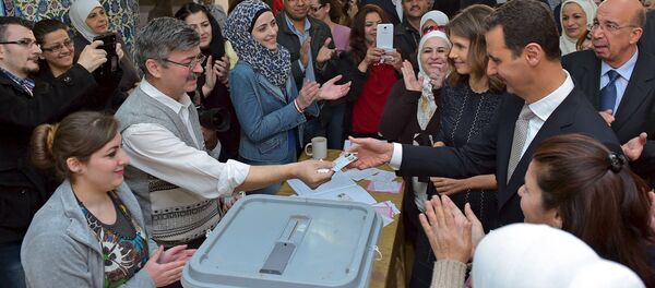 Suriye'de parlamento seçimleri / Beşar Esad - Esma Esad - Sputnik Türkiye