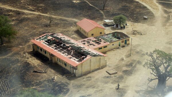 This picture taken on March 5, 2015 shows an arial view of the burnt-out classrooms of a school in Chibok,in Northeastern Nigeria - Sputnik Türkiye