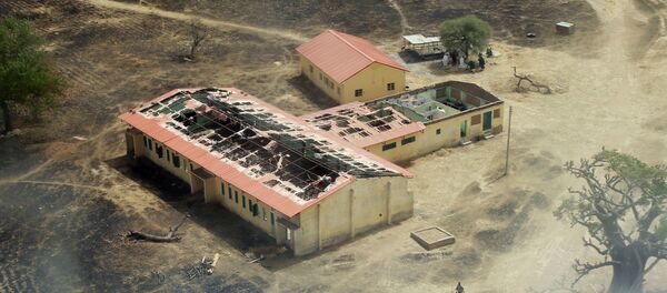 Boko Haram'ın 14 Nisan 2014'te 276 kız öğrenciyi kaçırdığı Çibok kasabasındaki okul - Sputnik Türkiye