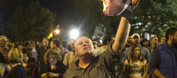 Makedonya'daki telekulak skandalının örtbas edilmesi protesto edildi Makedonya'daki telekulak skandalının örtbas edilmesi protesto edildi - Sputnik Türkiye