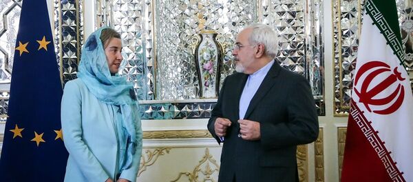 AB Dış İlişkiler ve Güvenlik Politikası Yüksek Temsilcisi Federica Mogherini - İran Dışişleri Bakanı Muhammed Cevad Zarif - Sputnik Türkiye