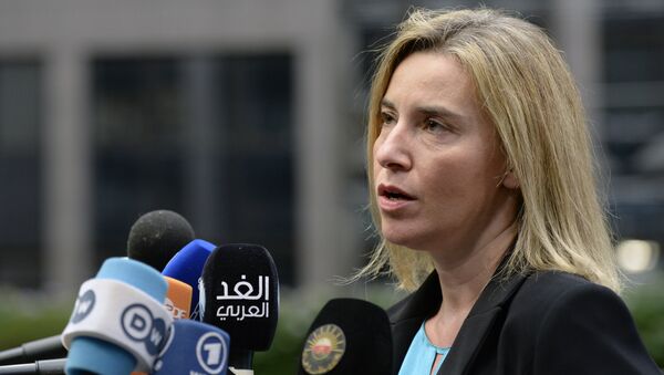 EU foreign policy chief Federica Mogherini speaks to the press as she arrives for a summit on relations between the European Union and Turkey and on the migration crisis at the EU headquarters in Brussels on November 29, 2015. - Sputnik Türkiye