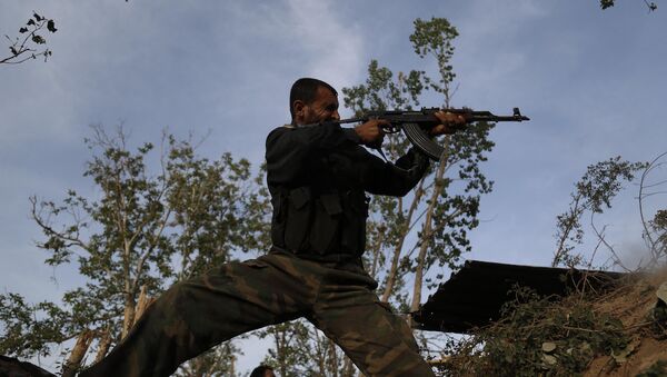 Şam'daki bir Feylak-ül Rahman militanı. - Sputnik Türkiye