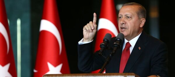 Cumhurbaşkanı Recep Tayyip Erdoğan, Cumhurbaşkanlığı Külliyesi'nde, 19 Mayıs Atatürk'ü Anma, Gençlik ve Spor Bayramı dolayısıyla verilen resepsiyonda, gençler ve sporcuları kabul etti. - Sputnik Türkiye