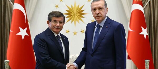 Ahmet Davutoğlu ve Cumhurbaşkanı Recep Tayyip Erdoğan. - Sputnik Türkiye