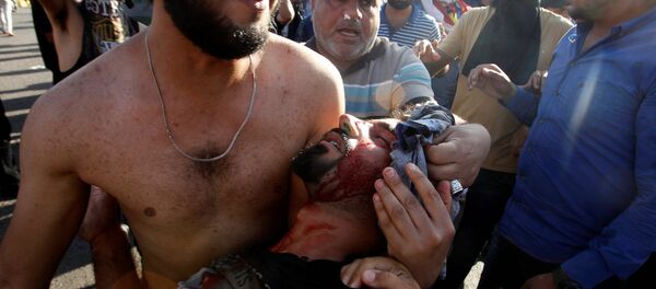 Bağdat'taki hükümet karşıtı eylemlere polis müdahale etti. - Sputnik Türkiye