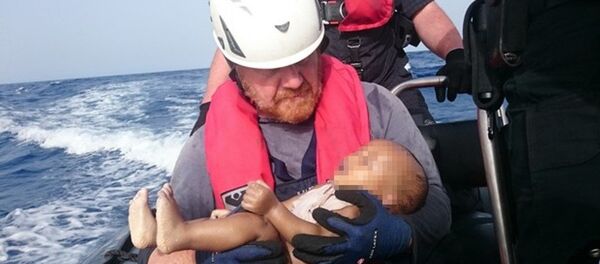 Libya açıklarında bir göçmen teknesinin batması sonucu hayatını kaybeden bebek Libya açıklarında bir göçmen teknesinin batması sonucu hayatını kaybeden bebek - Sputnik Türkiye