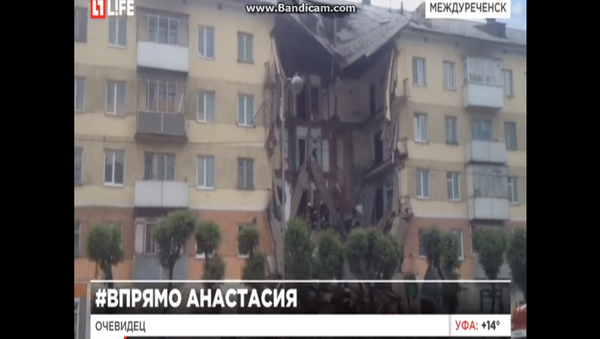 Rusya'nın güneyindeki Mejdureçensk kentinde beş katlı bir evin çökmesi sonucu en az iki öldü. - Sputnik Türkiye
