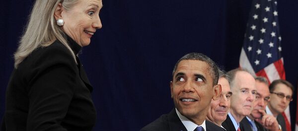 ABD Başkanı Barack Obama ve eski Dışişleri Bakanı Hillary Clinton. ABD Başkanı Barack Obama ve eski Dışişleri Bakanı Hillary Clinton. - Sputnik Türkiye