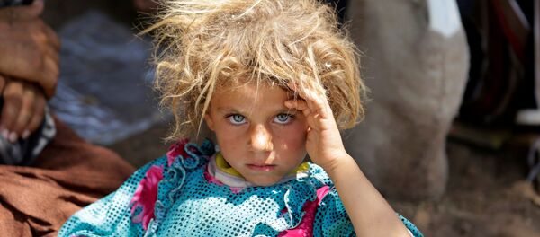 IŞİD'den kaçan Ezidiler - Sputnik Türkiye