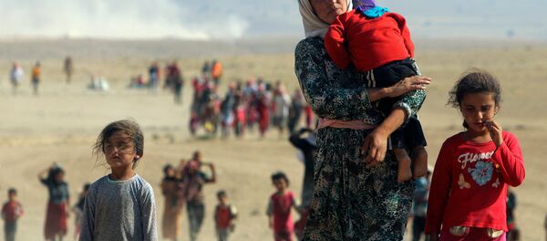 IŞİD'den kaçan Ezidi kadın ve çocuklar - Sputnik Türkiye