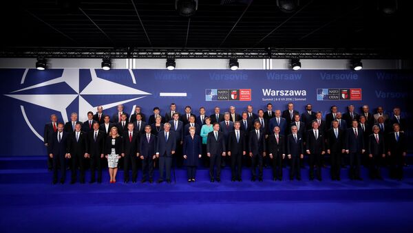 NATO heads of state and other leaders participate in a family photo at the NATO Summit in Warsaw, Poland July 8, 2016. - Sputnik Türkiye
