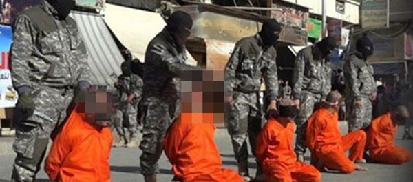 IŞİD militanları, Suriye'nin Rakka kentinde 5 futbolcunun kafasını kesti. - Sputnik Türkiye