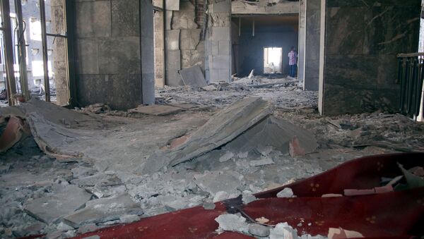 Darbe girişimi sırasında bombalanan TBMM'de en fazla hasar, başbakanlık makamının da bulunduğu 1.kat ile Şeref Holü'nde yaşandı. - Sputnik Türkiye