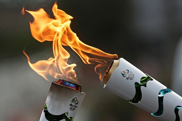 12 bin kişinin ellerinde 300 şehir gezen Olimpiyat Ateşi’nin yolculuğu 95 gün sürdü. - Sputnik Türkiye