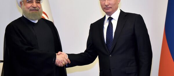 Rusya Devlet Başkanı Vladimir Putin ve İran Cumhurbaşkanı Hasan Ruhani - Sputnik Türkiye