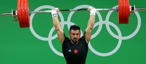 Milli halterci Daniyar İsmayilov Milli halterci Daniyar İsmayilov - Sputnik Türkiye