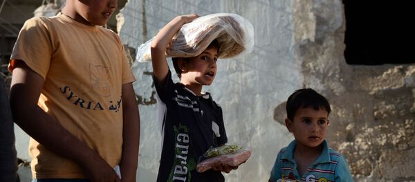 Rusya'dan Suriye'ye insani yardım Rusya'dan Suriye'ye insani yardım - Sputnik Türkiye