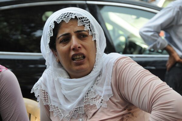 Saldırıda 13 yaşındaki oğlunu kaybeden Halime Alparslan, Gencecik çocuklara nasıl kıydılar? diyerek üzüntüsünü dile getirdi. - Sputnik Türkiye