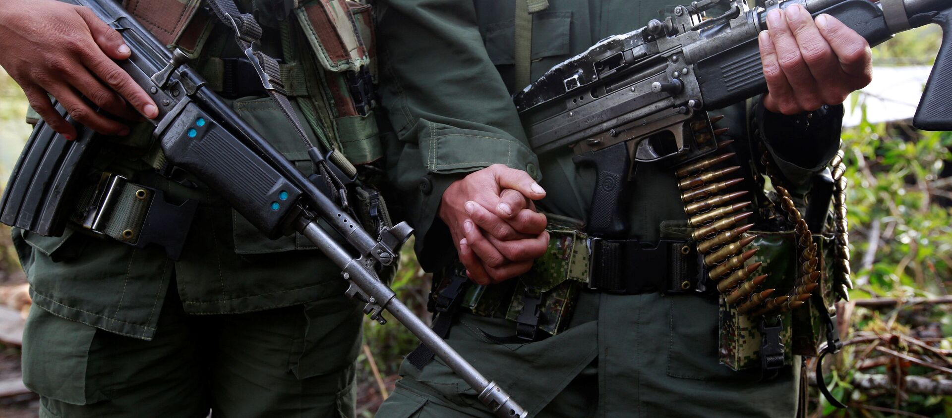 Reuters objektifine yansıyan FARC militanı bir çifte ait bu fotoğraf 16 Ağutos 2016'da çekilmişti. - Sputnik Türkiye, 1920, 21.07.2018