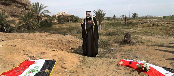 Irak'ta toplu mezar Irak'ta toplu mezar - Sputnik Türkiye