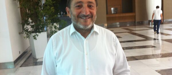 İstanbul Hazır Giyim ve Konfeksiyon İhracatçıları Birliği (İHKİB) Başkanı Hikmet Tanrıverdi - Sputnik Türkiye