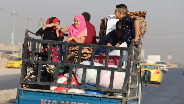 Kerkük'e sığınan 250 aile evlerine döndü - Sputnik Türkiye