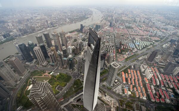Shanghai’de bulunan yüksekliği 492 metre olan bir Çinli dev yani Dünya Finans Merkezi. Bu bina Çin’in en yüksek binası. Dünyada 5. sırada bulunuyor. - Sputnik Türkiye