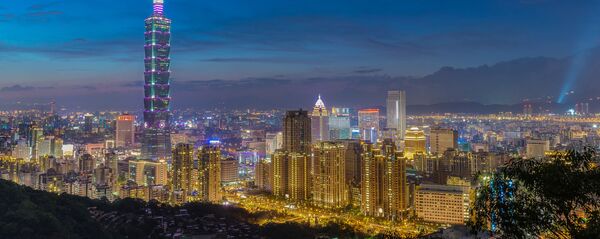 Ünlü Taipei Kulesi Tayvan başkentinde bulunuyor.  Yüksekliği 509 metre. - Sputnik Türkiye