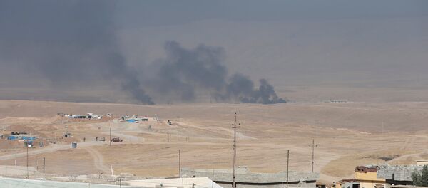 Musul operasyonu başlamasının ardından bölgeden dumanlar yükseliyor. - Sputnik Türkiye
