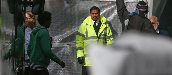 Fransa'dan İngiltere'ye gelen sığınmacıların kabul edildiği merkezin etrafına perde çekildi. - Sputnik Türkiye