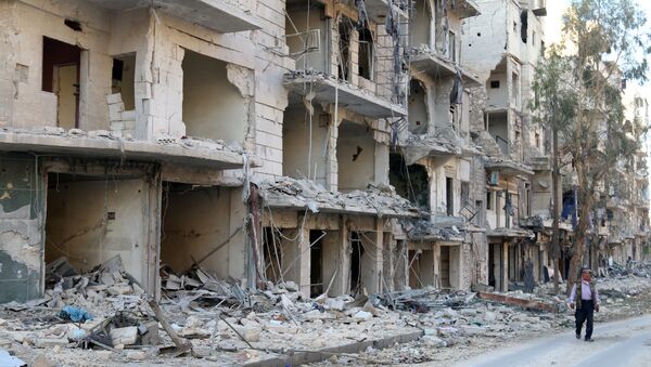 Suriye'nin Halep kentinde harap olmuş binalar - Sputnik Türkiye