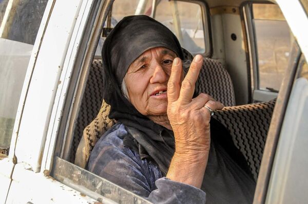 IŞİD'in zulmünden kaçan Musullu bir köylü kadını - Sputnik Türkiye