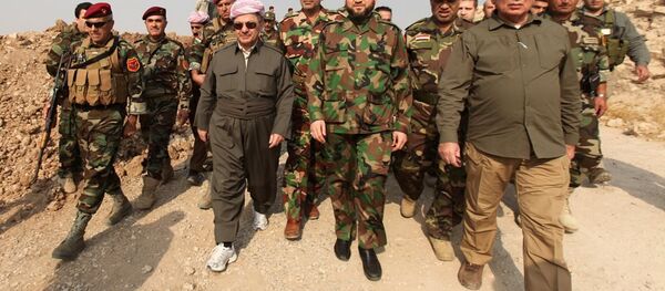 Irak Kürt Bölgesel Yönetimi (IKBY) Başkanı Mesud Barzani, Şii Ulusal Koalisyonu lideri Ammar el Hekim'le birlikte Musul'da kameralar karşısına geçti. - Sputnik Türkiye