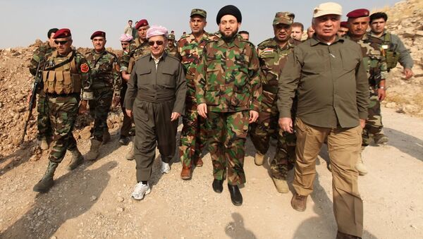 Irak Kürt Bölgesel Yönetimi (IKBY) Başkanı Mesud Barzani, Şii Ulusal Koalisyonu lideri Ammar el Hekim'le birlikte Musul'da kameralar karşısına geçti. - Sputnik Türkiye