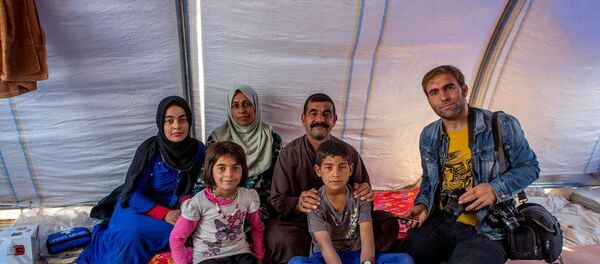 Musul'dan kaçan sığınmacılar Hazır'daki çadırkentte - Sputnik Türkiye