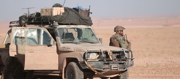 Reuters, Rakka operasyonuna katılan ABD askerlerini görüntüledi. - Sputnik Türkiye