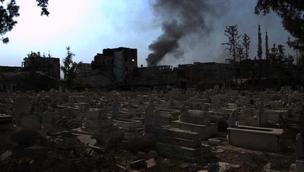 Suriye'nin Duma kentinde IŞİD'in yıktığı bir mezarlık - Sputnik Türkiye